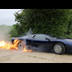 Here's A Jaguar XJ220 Setting Its Own Tires On Fire